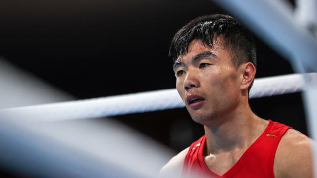 Bet365体育集团-视网膜两次脱落 胡建关靠毅力站在东奥拳击赛场